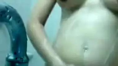 Indian girl always takes a camera when she goes to take a shower