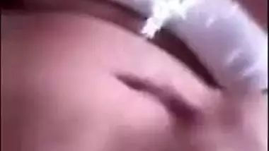 Indian chick in a red robe bares her natural XXX breasts to the sex fan