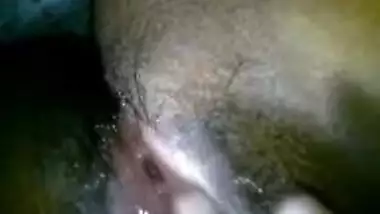 Devyani chats on the phone while recording her sexy boobs