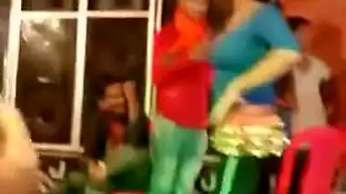 Two slim Desi teens seductively dance during XXX show under the tent