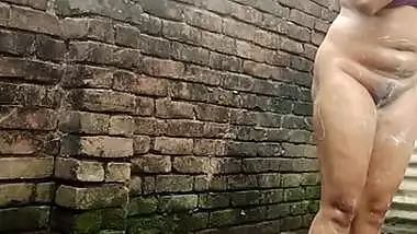 Shower scene of Bangladeshi village girl akhi looking beautiful with sexy dress. Teen hot girl is bathing in the bathroo