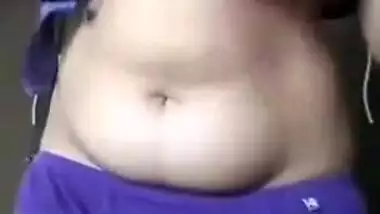 Indian girl takes colorful clothes off to bare hairy pussy for some porn