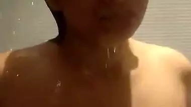 Nude MMS of a young lady taking an erotic shower