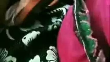 Aunty with perfect pussy lies in bed with legs wide open in XXX video