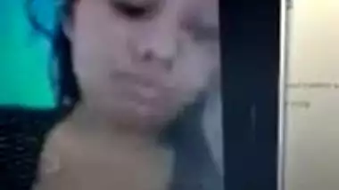 During video chat Desi gal reluctantly flashes BF her medium XXX tits