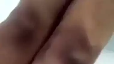 Beautiful desi girl lifting top to reveal sexy boobs