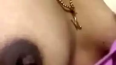 Desi lady has sexy nipples that she can reach with tongue in XXX video