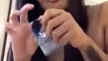 Teen exposes her XXX body and prepares a condom for subsequent sex