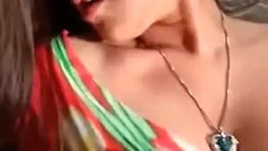 Staggering Desi porn girl in floral dress climbs the glass table
