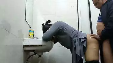 Wife in abroad fucked by office manager in washroom