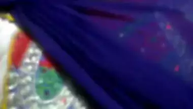 Teenage desi girl fondling her boobs through kameez