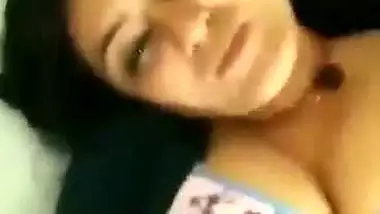 Young guy fucks his busty office colleague in a hotel room