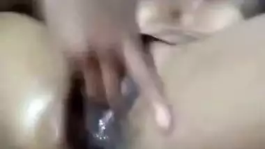 Nude Bangla girl sticks fingers into her juicy XXX cunt in Desi porn