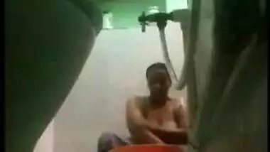 Desi MILF bares XXX charms taking a shower in front of a era