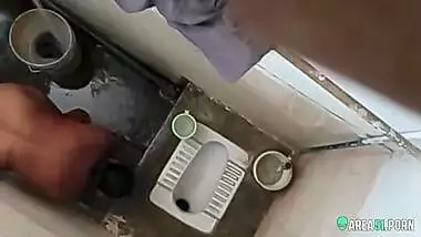 XXX clip of village aunty taking bath in outdoor taken on her son