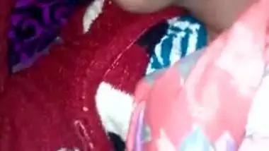 Wife is sleeping soundly while the Desi man is filming her XXX parts