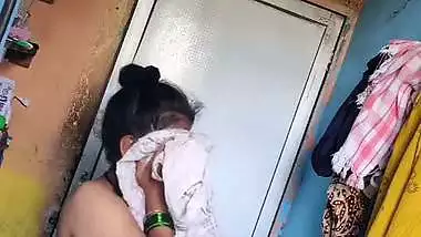 Perverted neighbor records a desi milf bathing in her bathroom