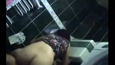 Horny couple enjoy a quick hardcore fuck in their friends washroom