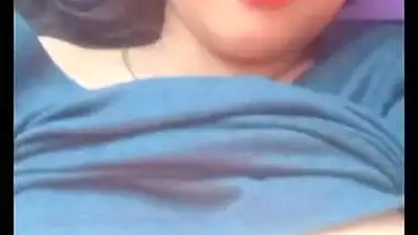 Bhabhi in glasses goes naked and fingers cunt