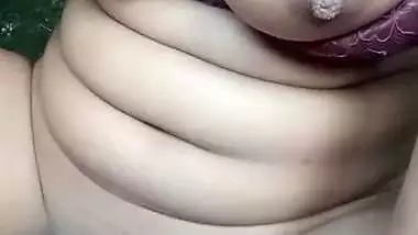 Desi nude girl plays with her boobs and pussy