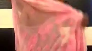 Shapely boobed desi bhabhi stripping saree